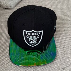 Black Raiders Cap with Iridescent Brim